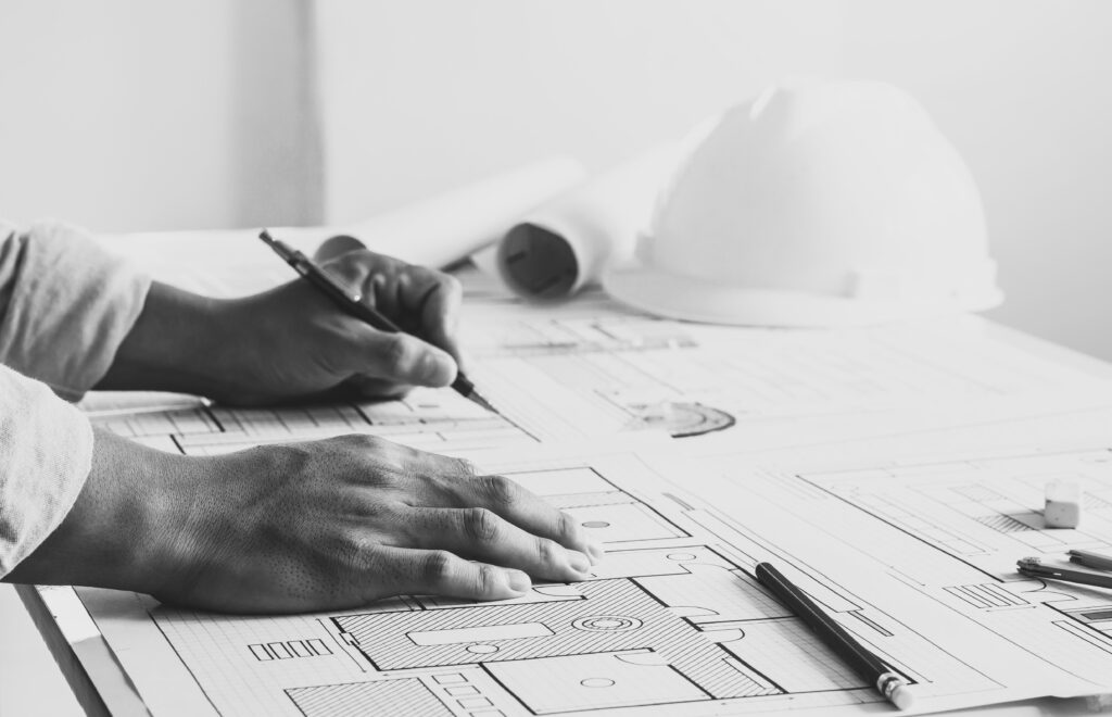 Architect drawing on architectural project.